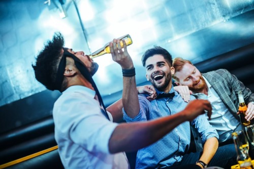 group of friends parties and drinks alcohol answering the question is alcohol a stimulant or depressant