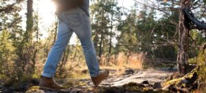 Man walking on a nature path trail 