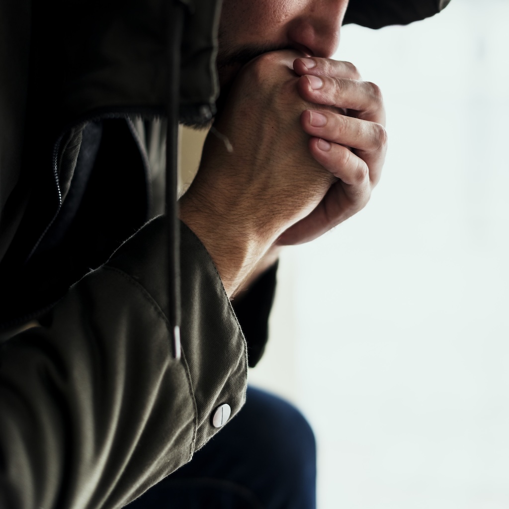 Thoughtful Man Feeling Cold in Winter