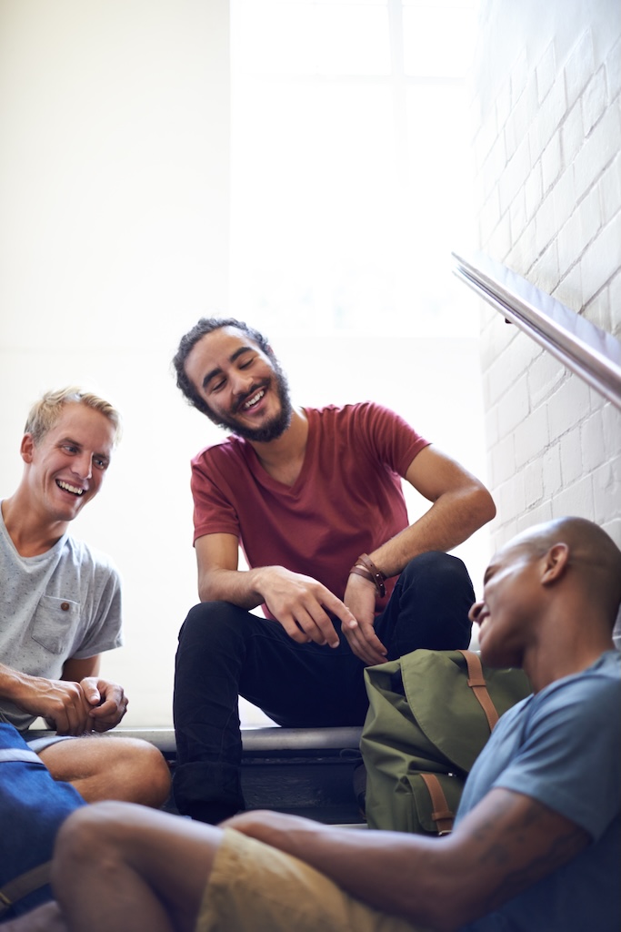Young adult men spending time together, forming community.